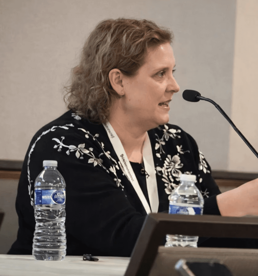 Kathryn Meyer speaking on a panel